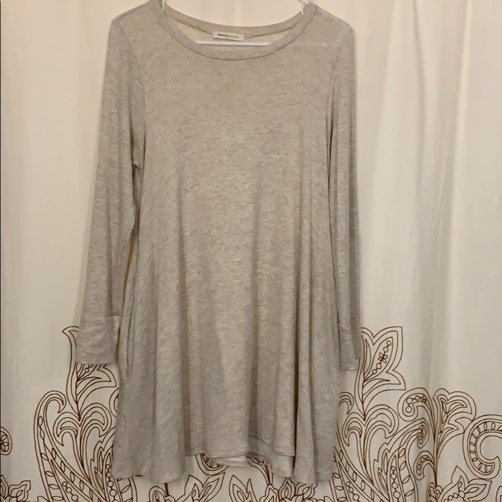 Tan dress with pockets and elbow embellishments